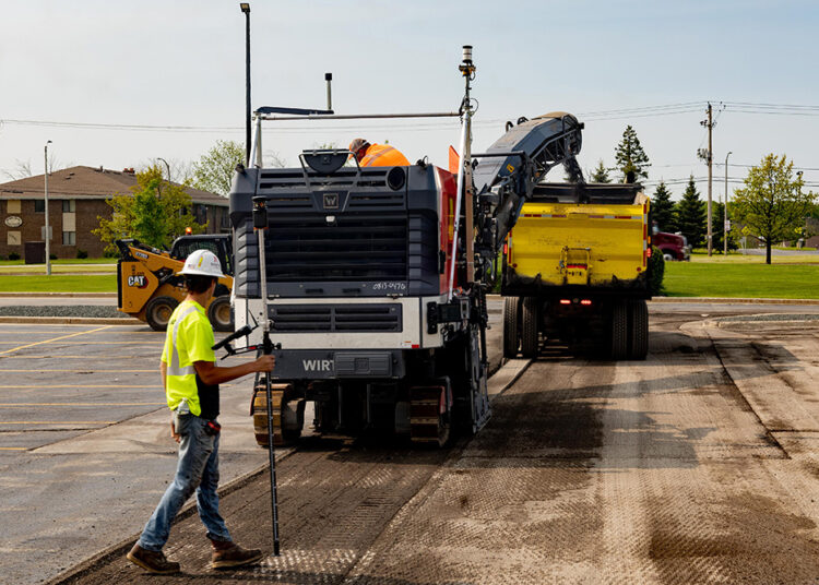 Trimble Roadworks' paving-control platform automatically guides the milling drum to cut the ideal depth and slope, with quality assurance confirmed by a grade-checker leveraging Trimble Siteworks software (image courtesy Trimble)