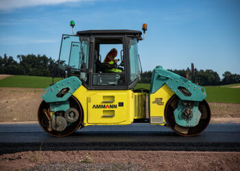 Symmetrical cab and fingertip steering