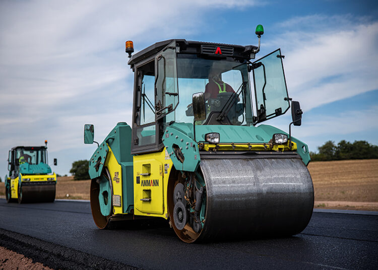 Symmetrical cab and fingertip steering