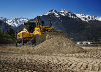 The PR 756 crawler dozer at work on a road construction site, pushing and grading material with precision and efficiency