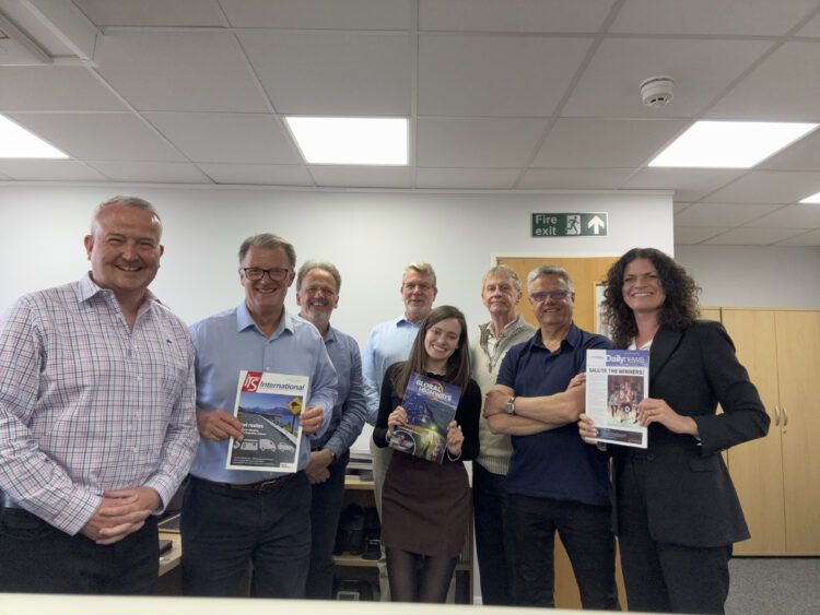 The ITS International and Global Highways teams with Prime CEO Christine Clancy (right)