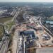 A new bridge has been installed by by the IRICAV Due Consortium to carry the new high speed rail line over the busy A4 highway in North Italy – (image: Webuild Group)